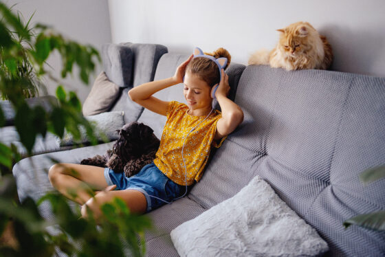 home technology and music concept teen girl wit 2023 11 27 05 16 08 utc 560x374jpg