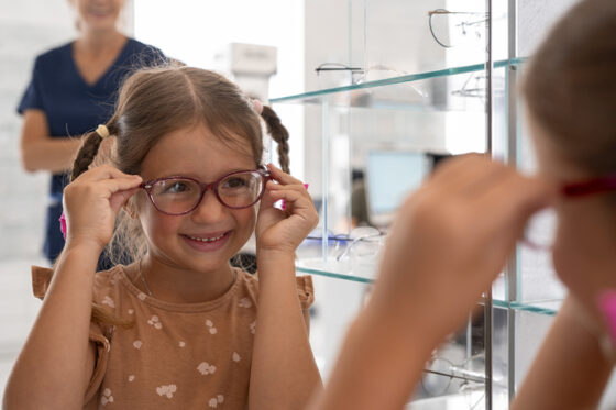 front view girl ophthalmologist s office 560x373jpg